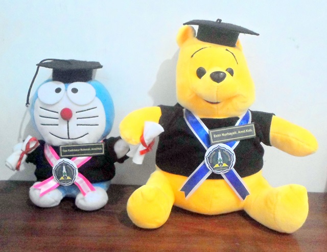 Boneka Pooh Toko Boneka Doraemon dan Pooh Poltekkes Kemenkes YK